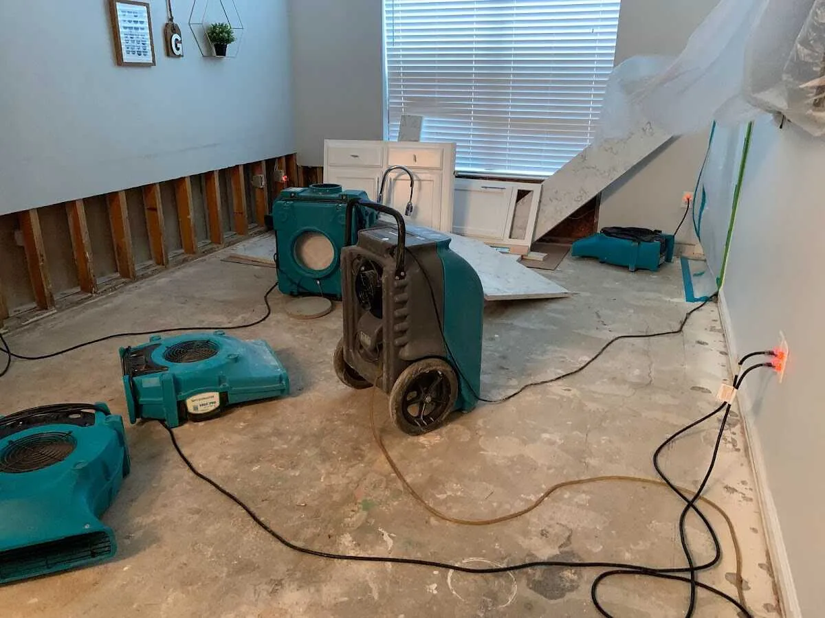 Dehumidifier in flood-cut room for Water Damage Restoration in Iola
